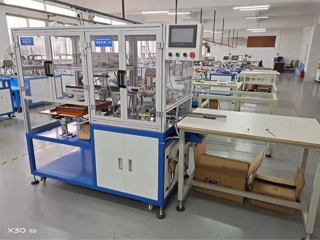 Automatic core assembly and testing machine